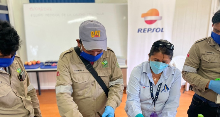 Repsol workers in a community